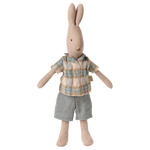 Maileg Rabbit, Size 1 - Classic, dressed in a plaid shirt and gray shorts, crafted from soft natural fabrics, stands upright against a plain white background.