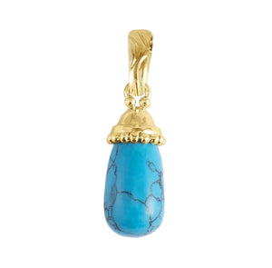 Add a unique touch to your necklace collection with the Milos Stone Drop Charm, Turquoise by Anabel Aram—a gold pendant featuring polished blue turquoise with black veining and a decorative gold cap and bail.