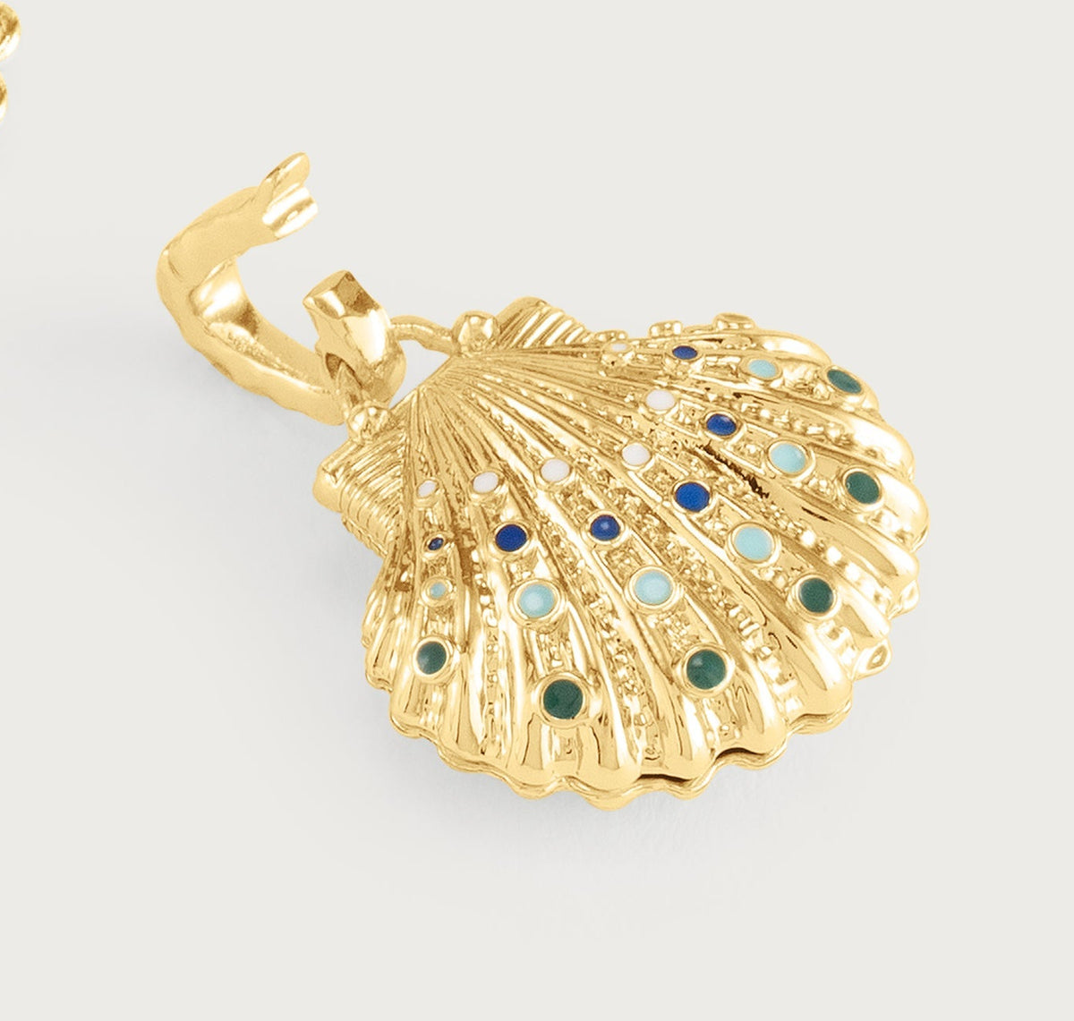 Gold Milos Shell Locket Charm with a hinged clasp and inlaid multicolored enamel dots.