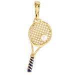 The Anabel Aram Tennis Racket Charm is a gold-plated necklace featuring a pearl at the center of the strings and a blue-striped handle.