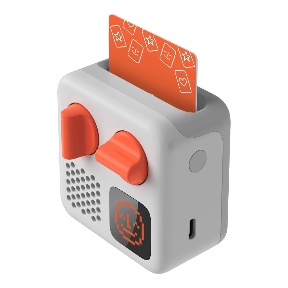 The Yoto Mini Player by Yoto is a travel-friendly device with a compact white body, accented by two red knobs and an orange card inserted at the top. Its front features a pixelated smiley face display and a small speaker grill, ideal for screen-free audio adventures.