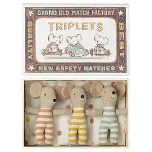 Maileg’s Baby Triplets in Box features three baby mice in striped outfits, snuggled together on a polka dot blanket.