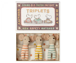 The Maileg Baby Triplets in Box, an ideal gift for kids, comes in a matchbox labeled "TRIPLETS" and features charming illustrations of mice driving cars. Inside, you'll find three adorable baby mice triplets dressed in orange, yellow, and green striped outfits. These delightful toys are crafted from recycled polyester by Maileg, making them an eco-friendly choice.