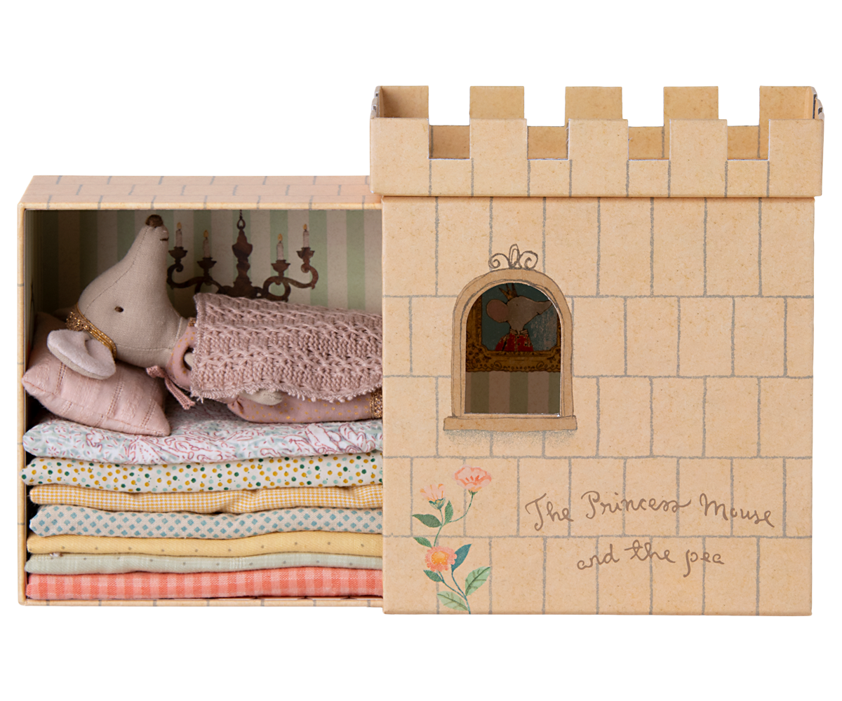 A Maileg Princess and the Pea Mouse playset with a Princess Mouse doll and multiple layered mattresses.