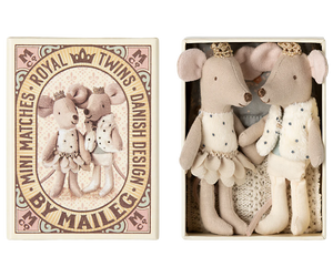 Two plush Royal Twin Mice, Little Sister & Brother by Maileg rest in a decorative matchbox, complete with charming beddings and golden crowns.