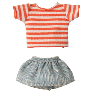 The Maileg Sister Mouse, Big Sister, wears a short-sleeved red striped t-shirt with a light blue knit skirt trimmed in white.