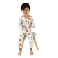 A young child in the Angel Dear Baby Boys' and Boys' Long Sleeve Loungewear Set sits barefoot on a small chair, holding a white object, against a plain white background.