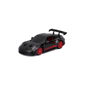 Maisto R/C 1:43 Die-cast Drifters Porsche 911 GT3 RS in black, featuring red wheels, a red side decal, and a large rear spoiler, displayed on a white background.