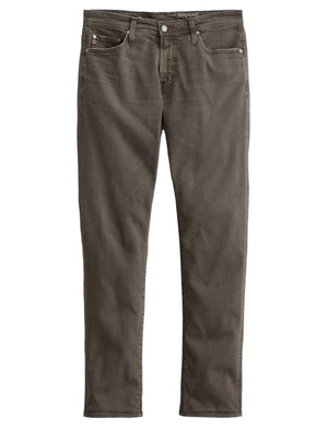 A pair of Tellis Modern Slim Denim jeans by AG Jeans in brown Hyper Soft Bull Denim, featuring a five-pocket design and straight-leg fit, displayed flat on a white background.