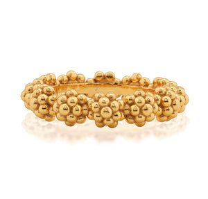 The Berry Icon Ring by Juliska Capucine De Wulf features clustered, rounded beads in a floral-inspired gold design—ideal as a stackable ring for a unique and elegant look.