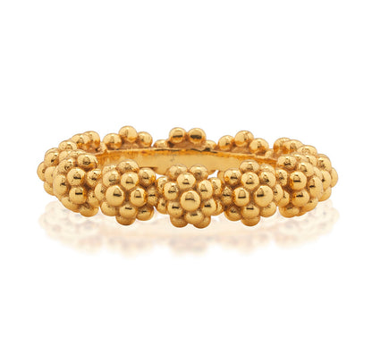 The Berry Icon Ring by Juliska Capucine De Wulf features clustered, rounded beads in a floral-inspired gold design—ideal as a stackable ring for a unique and elegant look.