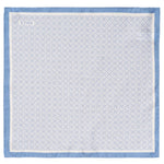 A light blue geometric silk pocket square by Eton with a subtle floral pattern and "ETON" in the corner.