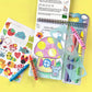 Discover Art on the Go! by Bright Stripes—a coloring set with a finished mushroom house drawing, animal stickers, crayons, and a stencil—perfect for sparking creativity wherever you are.