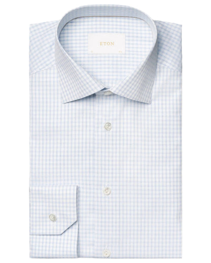 The Eton Light Blue Check Signature Twill Cut Away Contemporary Shirt features a smart check pattern, pocket, and buttoned cuffs—ideal for a polished business look.