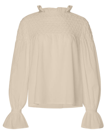 A Merlette New York Pima Cotton blouse with ruffled sleeves.