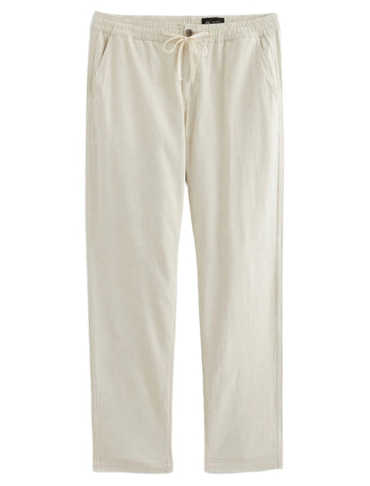 The Tate Drawstring Pant by AG Jeans features twill linen khaki fabric, a relaxed drawstring waistband, and side pockets, shown here laid flat on a white background.