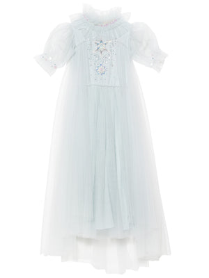 The Girls’ Snow Queen Tutu Dress by Tutu du Monde features a light blue tulle design with puffed short sleeves, a ruffled high neckline, and intricate decorative beading on the bodice. Its layered tulle skirt adds extra volume and enchantment, making it perfect for your little one’s ice queen costume.
