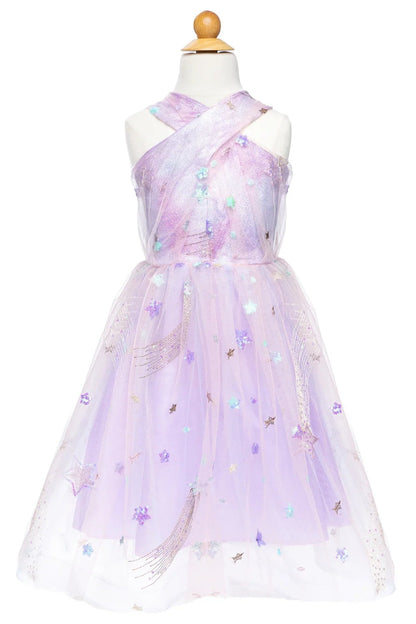 The Ombre Eras Lilac Dress by Great Pretenders is a child-sized lavender and pink tulle celestial gown featuring a crisscross halter neckline and adorned with sparkling stars—displayed on a mannequin, it’s the perfect magical pop star dress for little dreamers.