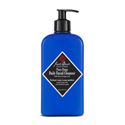 A 473 mL (16 fl oz) blue pump bottle of Jack Black Pure Clean Daily Facial Cleanser, formulated to help prepare shave-ready skin.