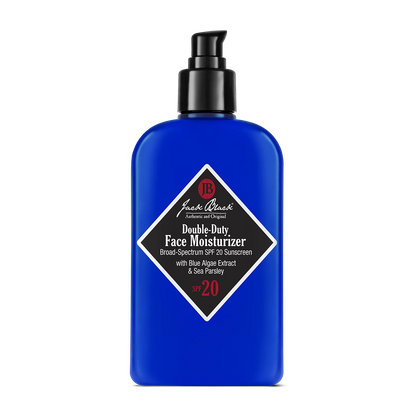 A blue bottle of Jack Black Double-Duty Face Moisturizer comes with a pump dispenser and a black label displaying product details. This lightweight formula offers broad-spectrum SPF 20 and is enriched with antioxidants to provide extra skin protection.