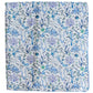 The Timo & Violet Crib Quilt is a square cloth with octopuses, fish, coral, and seaweed in blue, green, and purple on white—an eco-friendly bedding choice for your nursery.