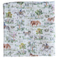 The Timo & Violet Shawl Blanket is made from white organic cotton with a repeating horse, rider, and tree pattern in muted green, brown, blue, and purple—ideal as a soft baby accessory or cozy blanket.