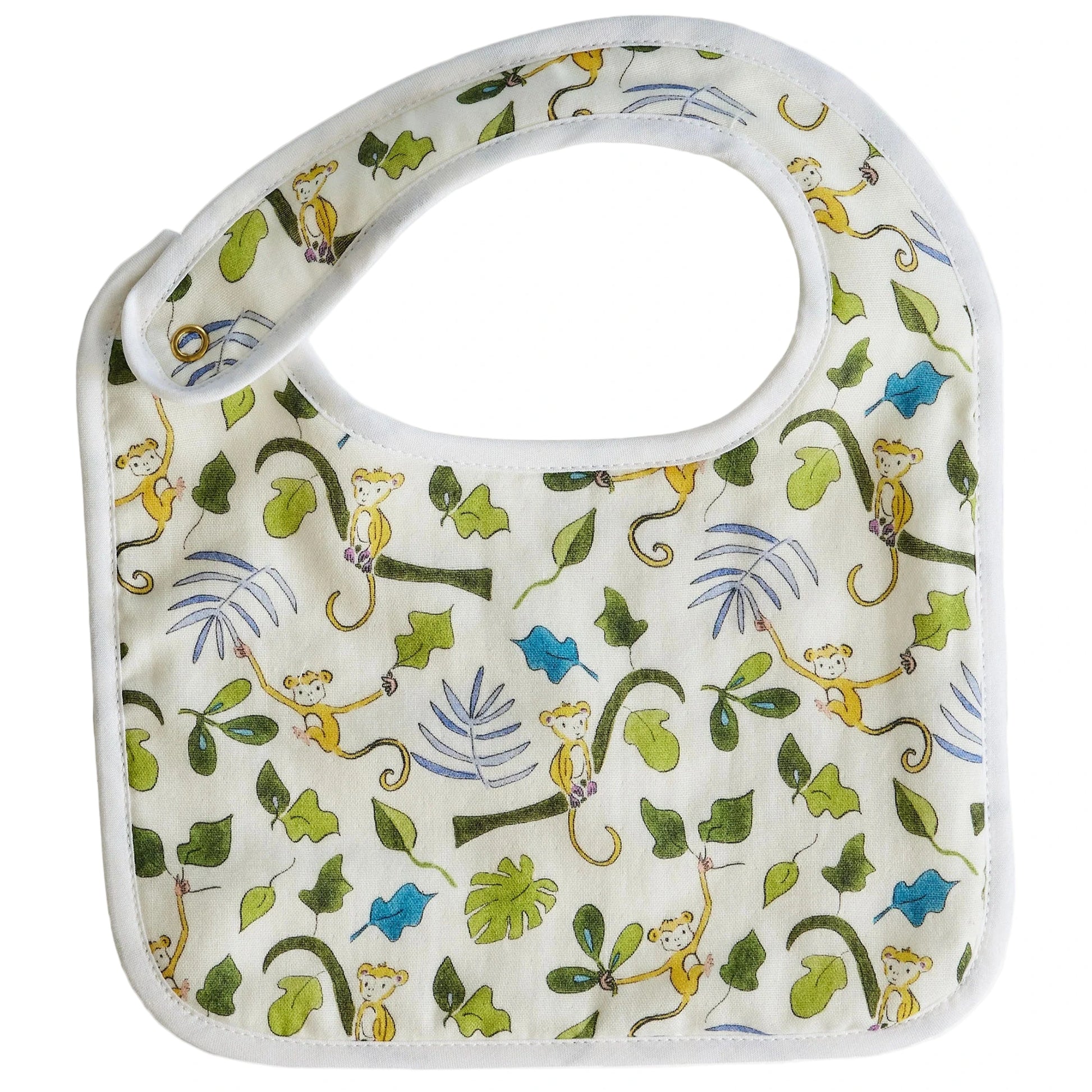 The Perfect Bib by Timo & Violet is a baby muslin bib with a white background, decorated with green leaves and little yellow monkeys climbing on branches.