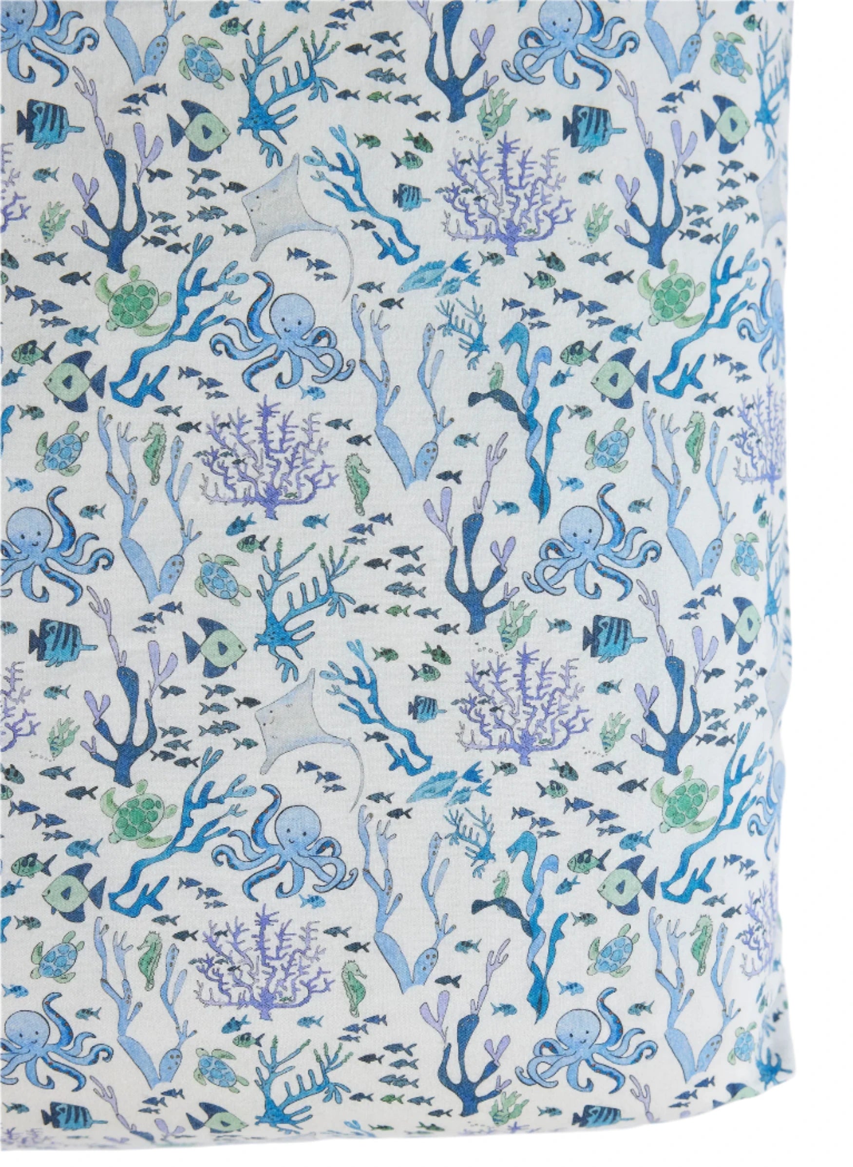 The Timo & Violet Crib Sheet features a soft, breathable design with blue and purple sea life—including octopuses, fish, coral, and seaweed—on a white background, perfect for your little one's nursery.
