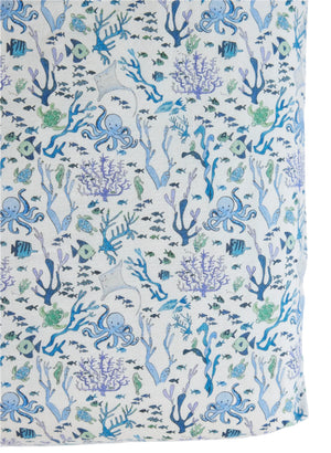 The Timo & Violet Crib Sheet features a soft, breathable design with blue and purple sea life—including octopuses, fish, coral, and seaweed—on a white background, perfect for your little one's nursery.