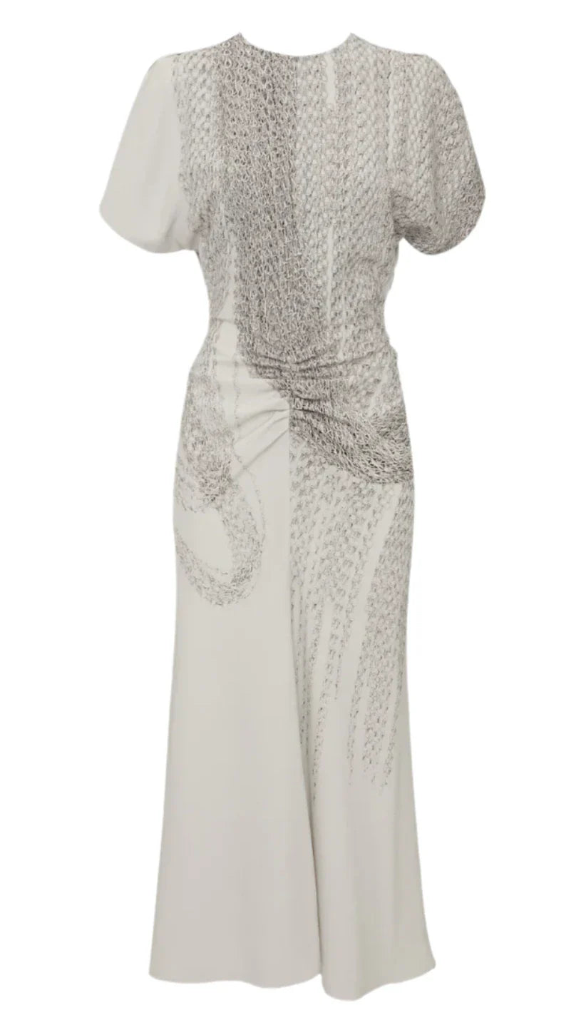 The Victoria Beckham Gathered Waist Midi Dress features a chic white design with a gathered waist and abstract silver sequin patterns on the bodice, hips, and skirt—capturing the brand's signature elegance.