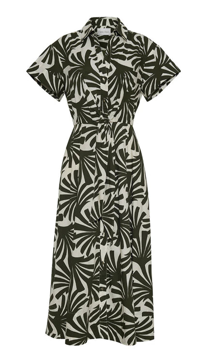 The Asbury Midi Dress by Cara Cara features short sleeves, a button-down front, black and white leaf print, collar, and self-tie waist—making this stylish shirt dress an effortless must-have.