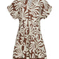 The Nash Mini Dress by Cara Cara is a short-sleeved, button-front shirtdress featuring a brown and white abstract leaf print and a fit-and-flare silhouette.