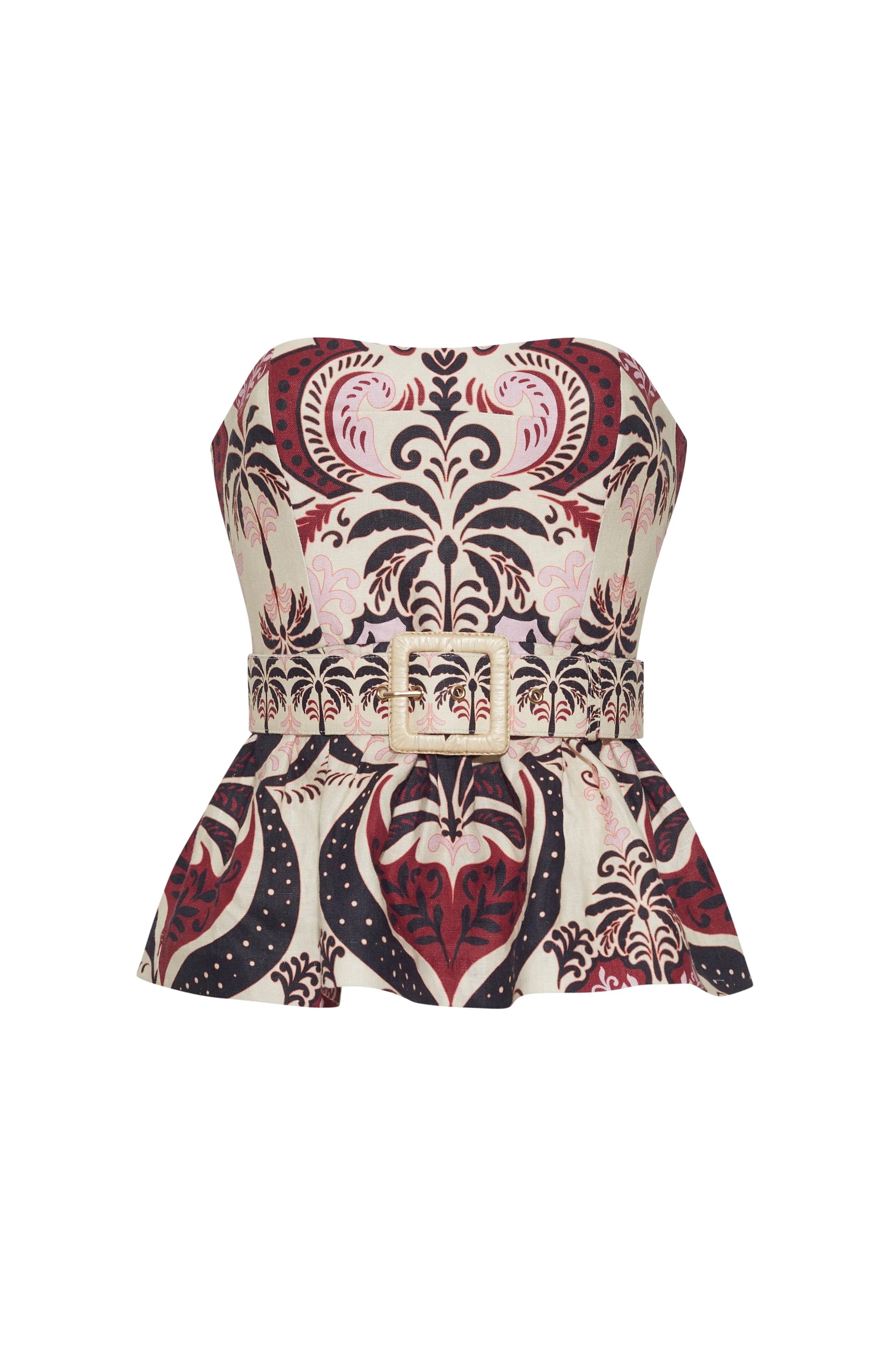 The Tilda Top by Cara Cara is a strapless peplum style with boning for structure, a belted waist with square buckle, and an ornate red, black, and cream pattern.