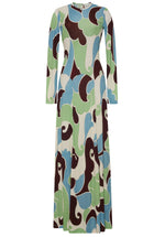 The Aspen Dress by Cara Cara is a long-sleeve maxi with a bold retro swirl pattern in green, blue, brown, and cream, featuring a shaped waist seam for added definition.