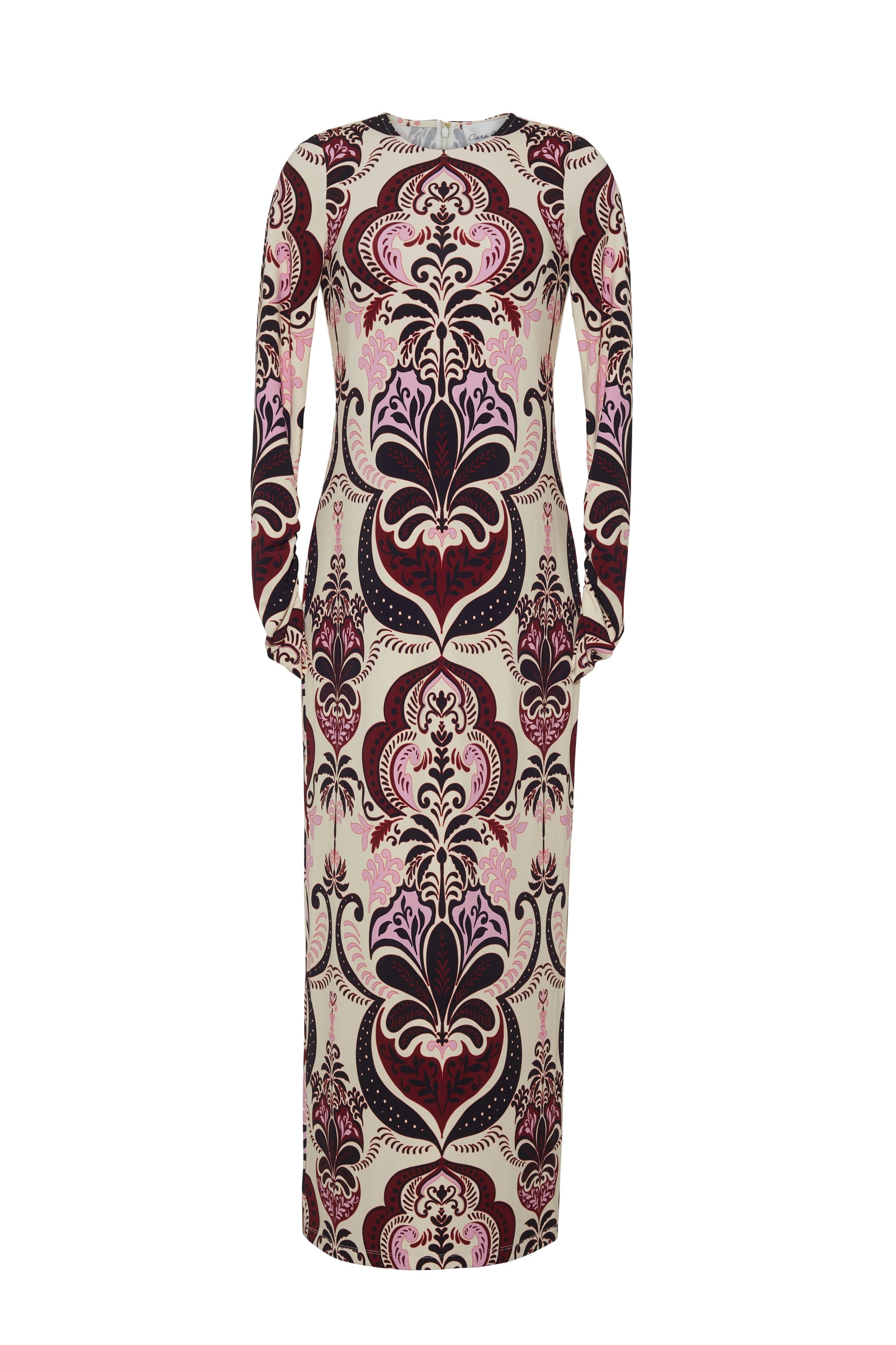 The Danae Midi Dress by Cara Cara is a long sleeve column dress featuring a bold, symmetrical floral and paisley print in burgundy, pink, and cream on a plain white background.