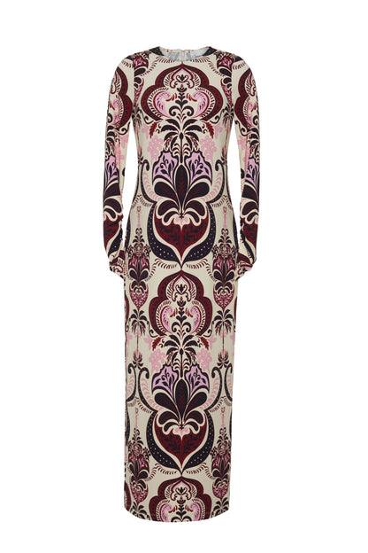 The Danae Midi Dress by Cara Cara is a long sleeve column dress featuring a bold, symmetrical floral and paisley print in burgundy, pink, and cream on a plain white background.
