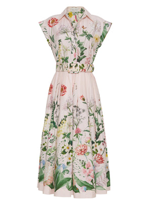 The Octavia Dress by Cara Cara is a sleeveless, collared fit-and-flare midi with a button front and matching belt, featuring a pink base with colorful floral print.