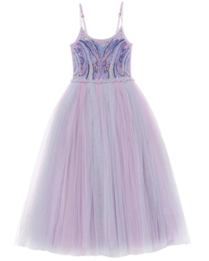 The Girls’ Goodspell Glimmer Tutu Dress by Tutu du Monde features delicate thin straps, a fitted sequin bodice adorned with blue and purple beaded accents, and a full, floor-length lavender tulle skirt. This enchanting design beautifully captures the essence of a classic purple tutu dress with its elegant and striking details.