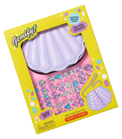 The Super Smalls Mermaid Gemify Purse is a shell-shaped kids bag in a yellow box, featuring over 150 gem stickers for creative DIY decoration.