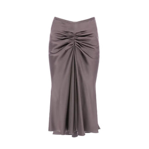 The Victoria Beckham Bela Skirt is a long, high-waisted taupe grey crepe back satin skirt with front ruching and a slight flare at the hem for a polished look.