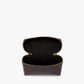 The Vanity Croc Crossbody by Victoria Beckham features dark brown croc-embossed leather in a rectangular shape with a gold zipper, and opens to a black interior with an inner pocket for organization.