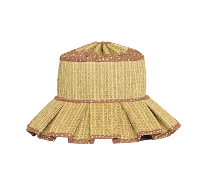 Introducing the Luxe Beauty Point Hat by Lorna Murray: a stylish wide-brimmed woven straw sun hat, adorned with brown polka dot fabric trim along the top and brim and a distinctive pleated design—an essential UPF 50+ accessory for chic travel.