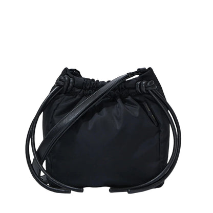 A Proenza Schouler Drawstring Nylon Tote in black, featuring leather straps and a minimalist design on a white background, adorned with a subtle gold foil logo.