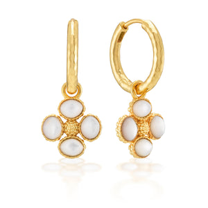 Juliska Capucine De Wulf’s Berry Clover Hoop Earrings with Double Sided Charm feature gold hammered hoops with chic dangling four-stone clover charms set in gold bezels.
