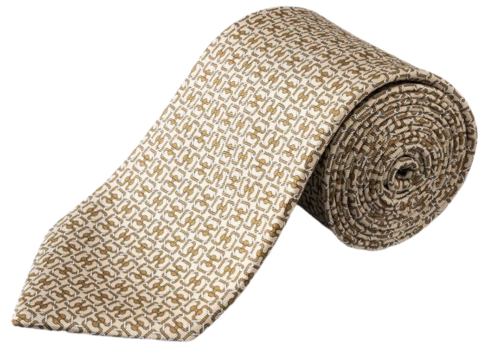 The Eton Geometric Print Silk Tie, in beige and brown, is rolled up to showcase its elegant twill weave and striking geometric design.