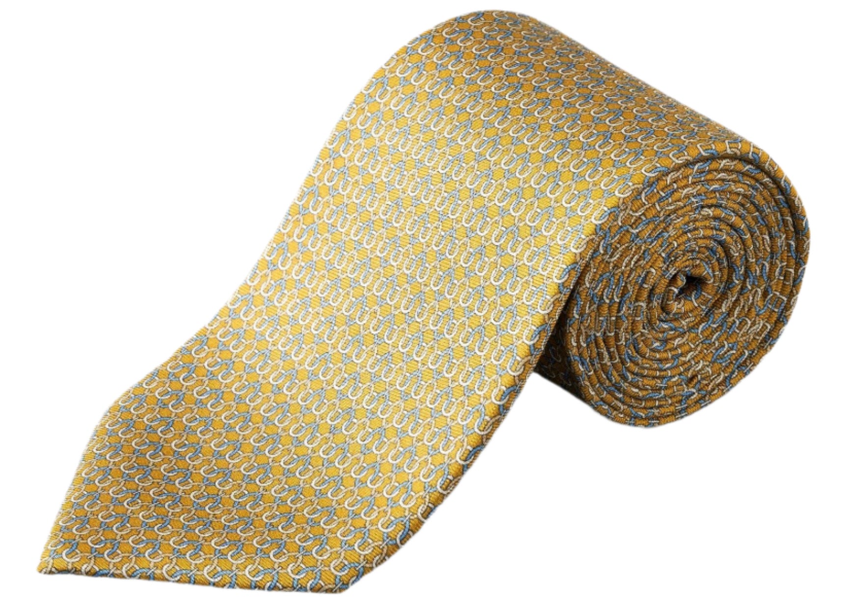 The Eton Geometric Print Silk Tie features a yellow silk base with a small blue and white geometric pattern—ideal for classic suiting.