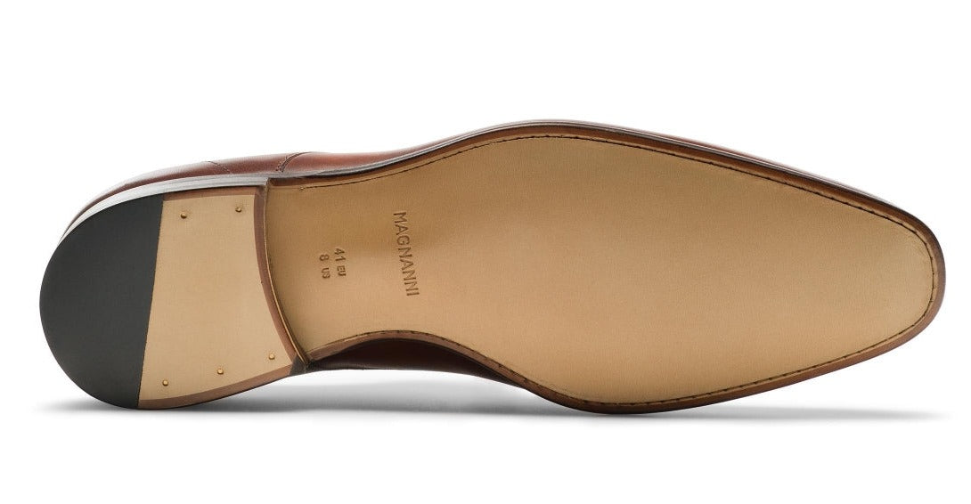 Underside view of a Magnanni Maddin Lace-Up showcasing the sole and heel construction.