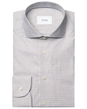 The Eton Slim Cut Away Micro Check Twill Shirt is a long-sleeve, button-up dress shirt in light blue and beige micro check, made from organic cotton.