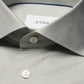 Close-up of the Eton Slim Wide Spread Micro Check Twill Shirt in light grey, featuring a subtle micro check pattern, white buttons, and the signature brand label inside the collar.