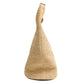 Side view of the Simkhai Khai Large Raffia Hobo Bag with a rounded base, single handle, and subtle leather buckle, shown against a white background.